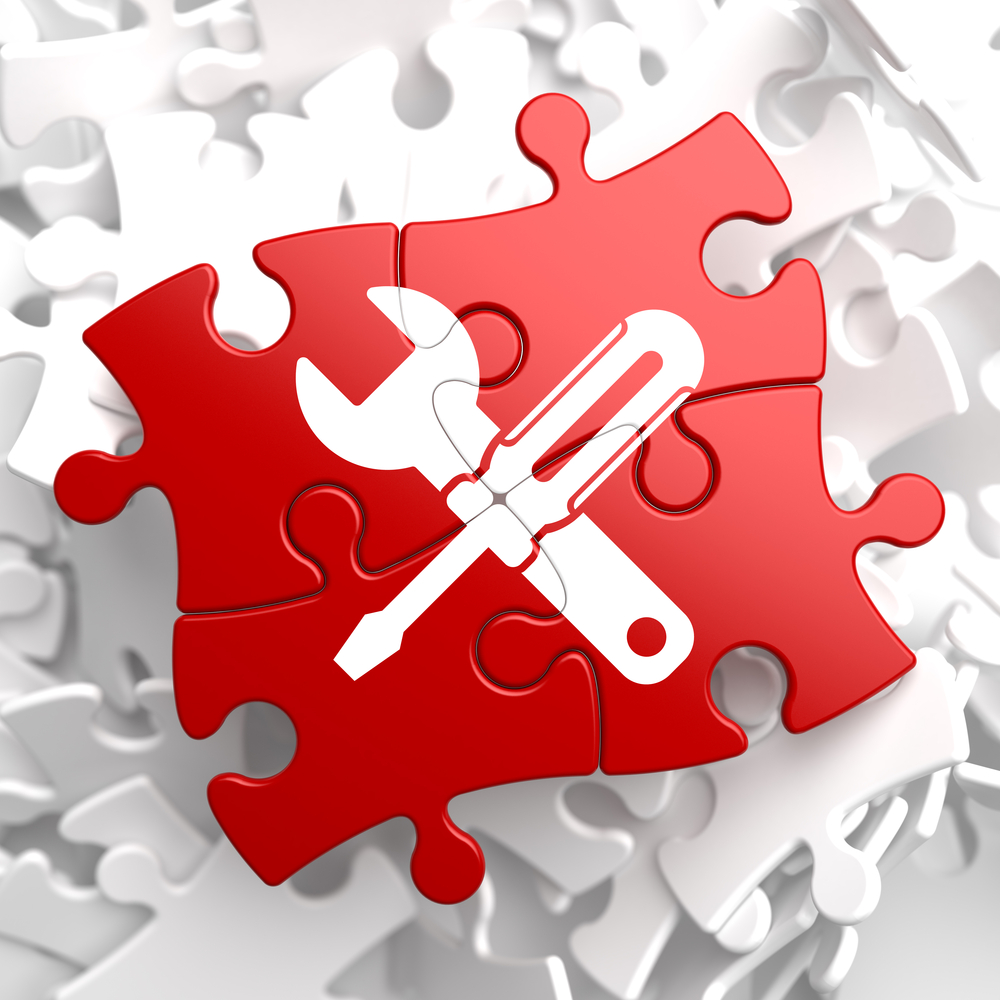 Service Concept - Icon of Crossed Screwdriver and Wrench - Located on Red Puzzle. Business  Background.
